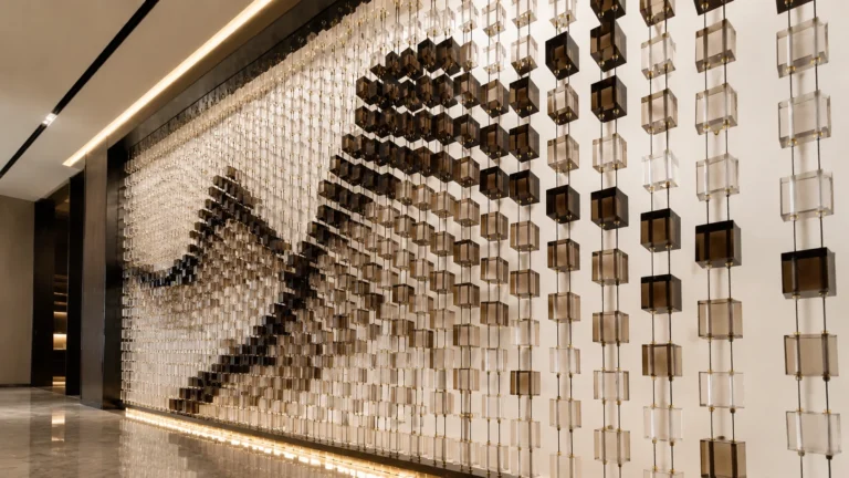 Shaped crystal modules arranged as a mountain landscape feature wall composition